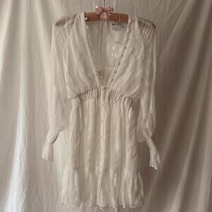Romantic white sheer mini dress